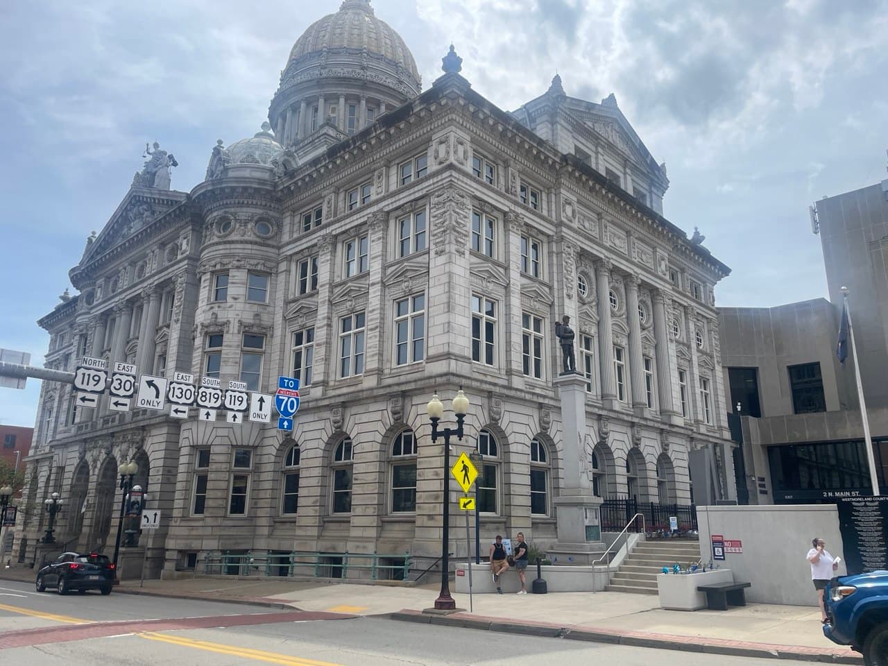 Westmoreland County Courthouse in Greensburg with Route 30 and 119 signs visible nearby